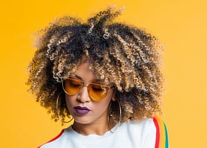 Natural tight curls with highlights